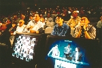 Rapt audience members follow closely at the Deep Blue vs. Kasparov re-match in New York City, New York